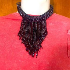 Choker dangly necklace.
